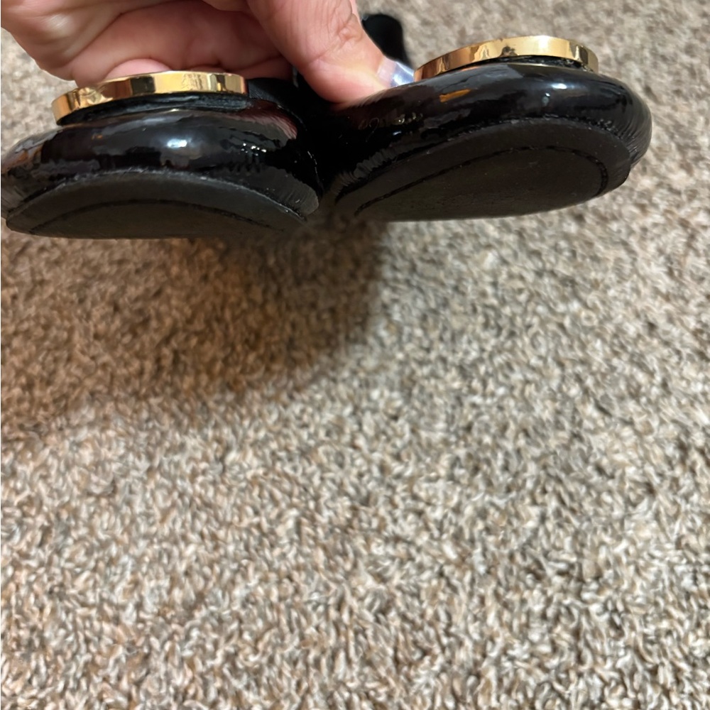 Tory Burch Shiny Black Flats with Gold Logo - Picture 3 of 9